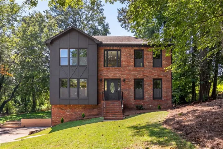 Red brick exterior with dark trim accents