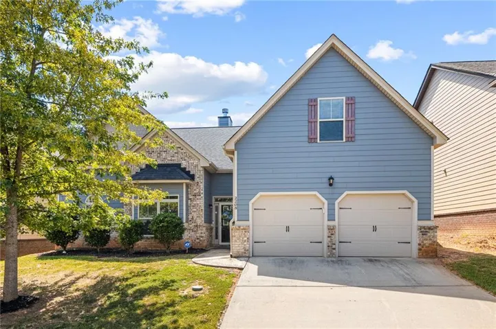 Vinyl siding exterior with stone accents