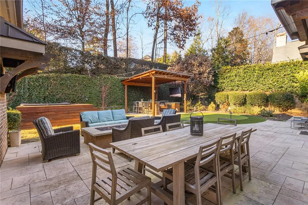 Dine al-fresco under the stars and the string lights.  Owner has also installed a whole mosquito system out here to keep the bugs at bay.  This space is super private. You literally don't see a neighbor from here.