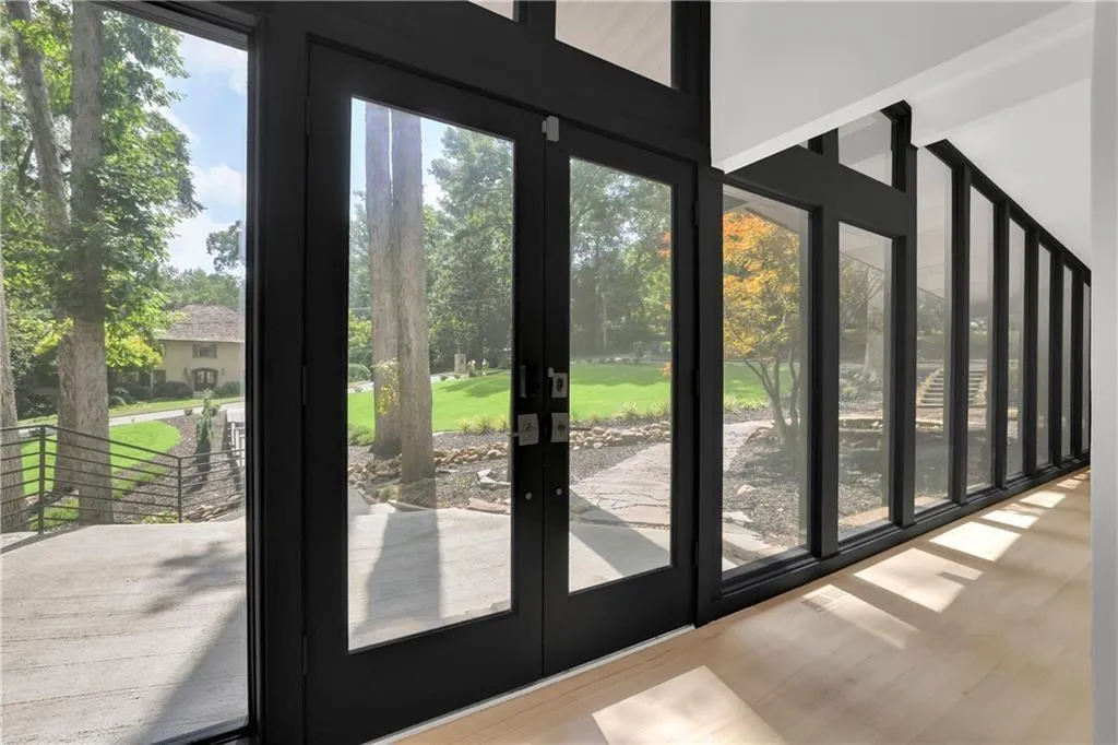 Doorway to outside featuring wood finished floors and french doors
