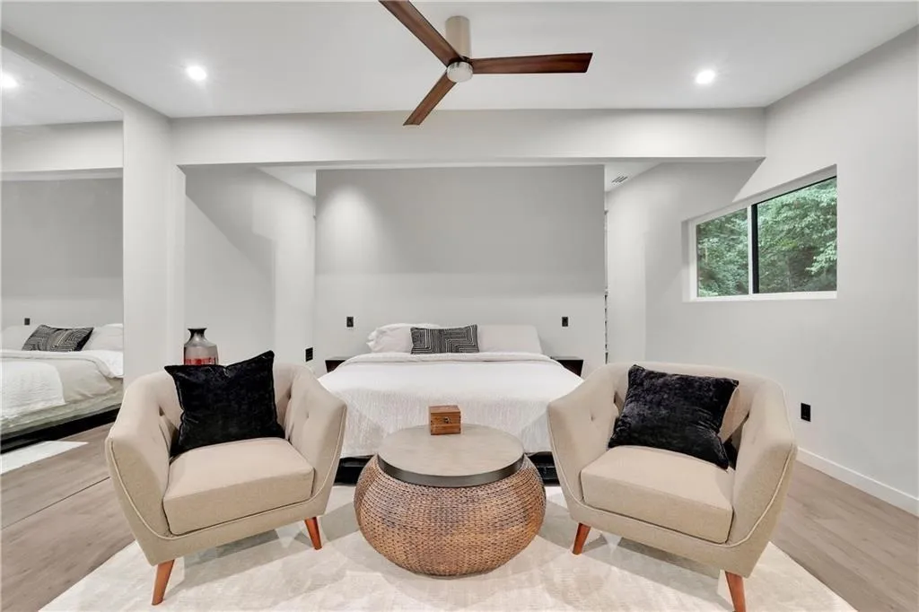 Bedroom featuring wood finished floors, recessed lighting, and ceiling fan
