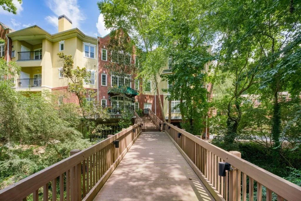 Guest entrance with bridge to guest parking and pool