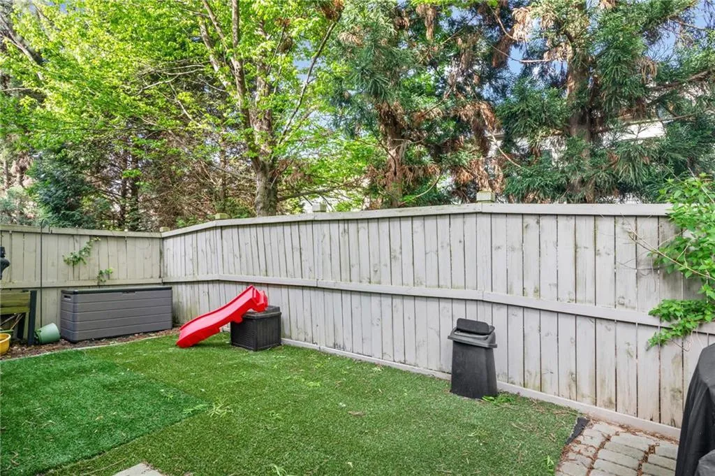 View of fenced backyard
