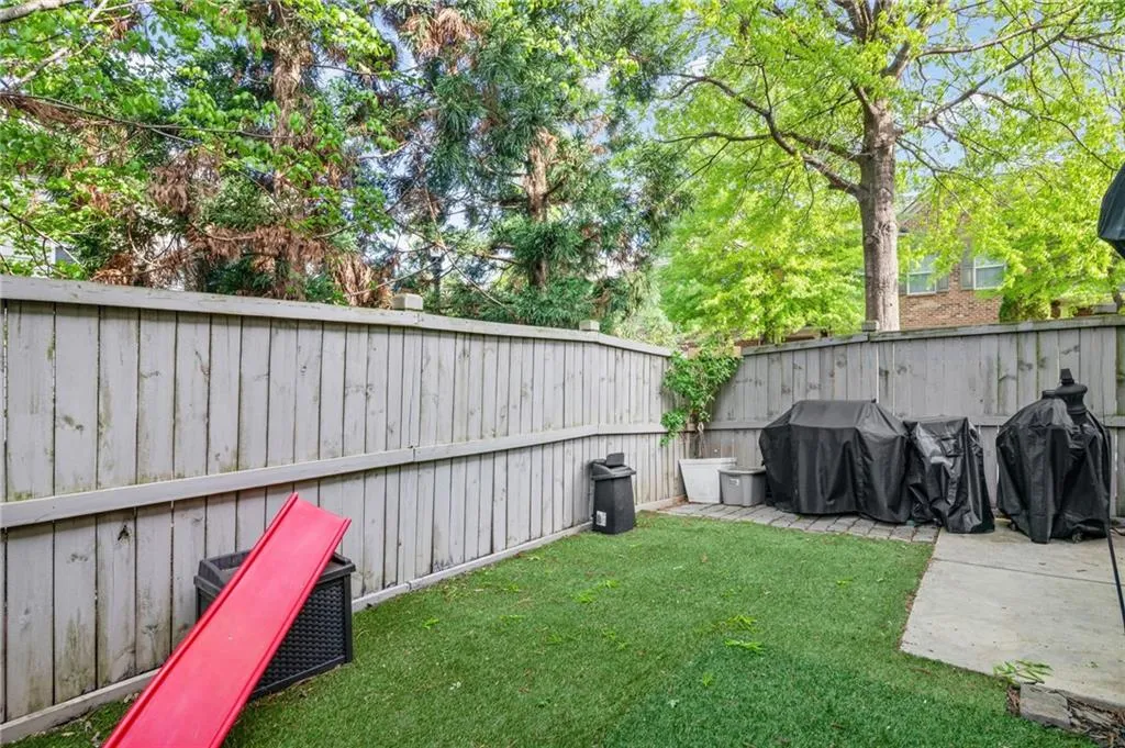 Fenced backyard featuring a patio area