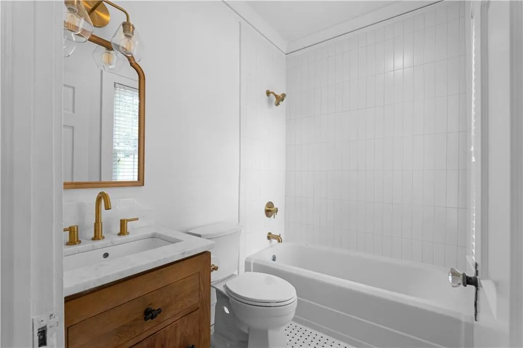 Full bath with toilet, tub / shower combination, and vanity
