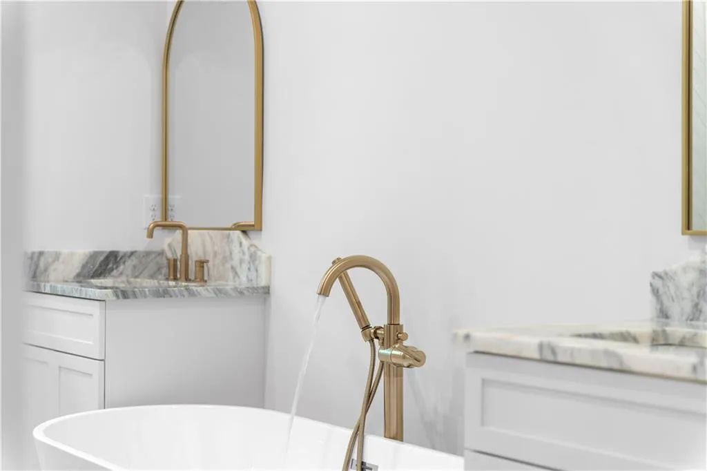 Bathroom with a freestanding bath and vanity