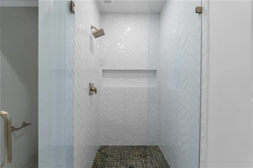 Full bathroom with a stall shower