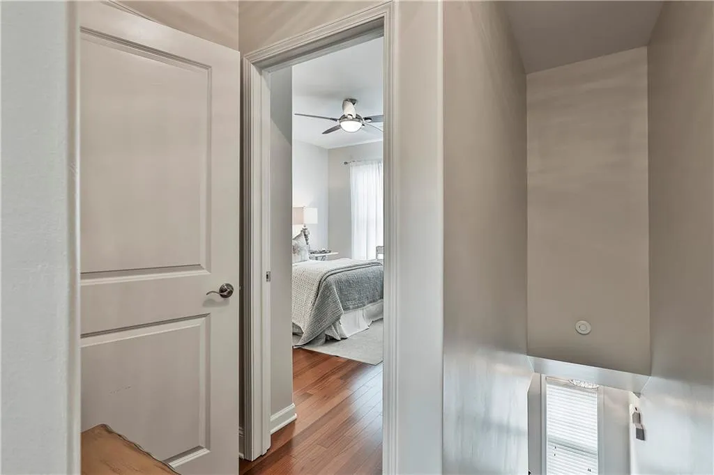 Hallway featuring wood finished floors