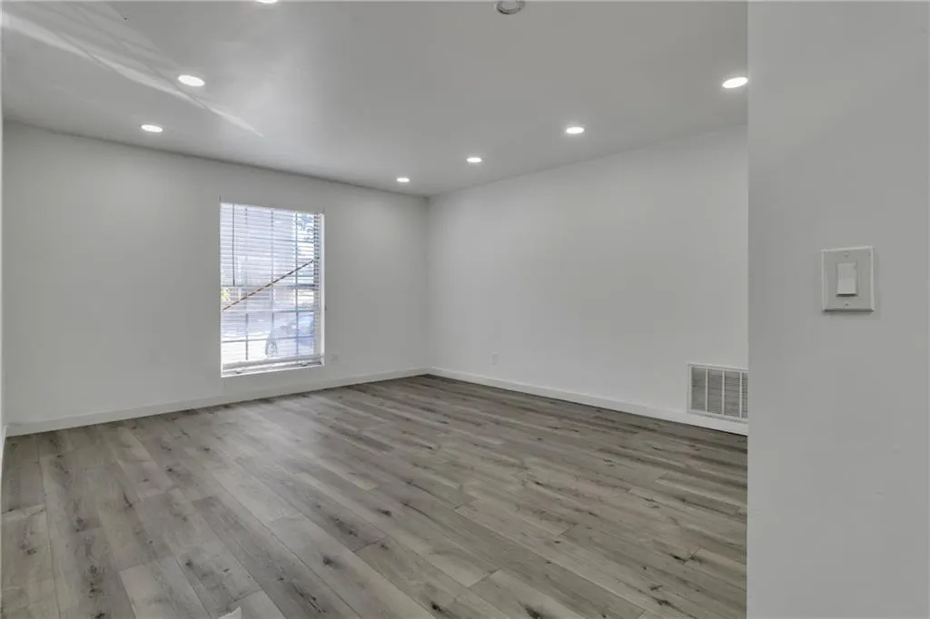 Spare room with recessed lighting and light wood finished floors