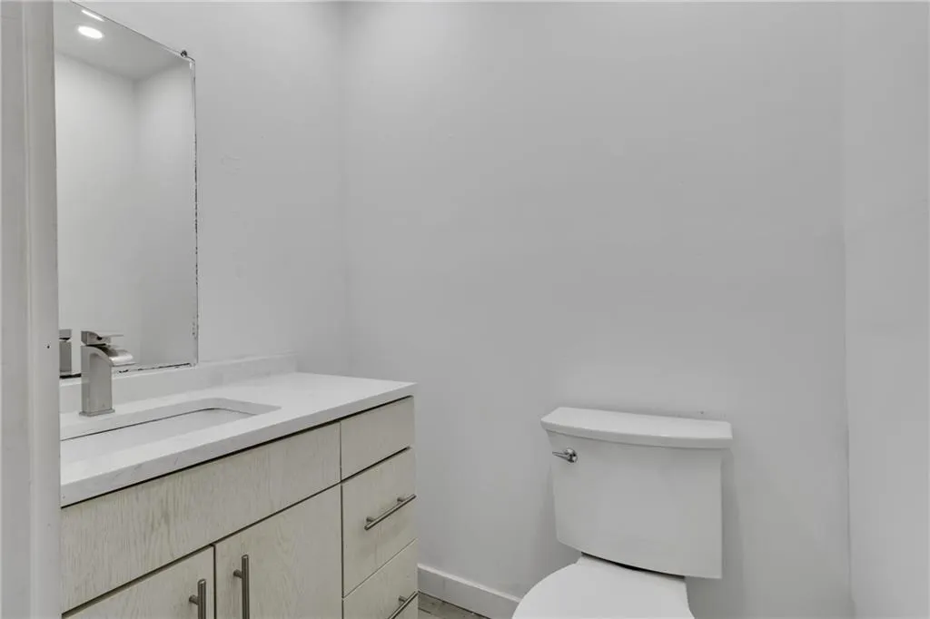 Bathroom with vanity and toilet