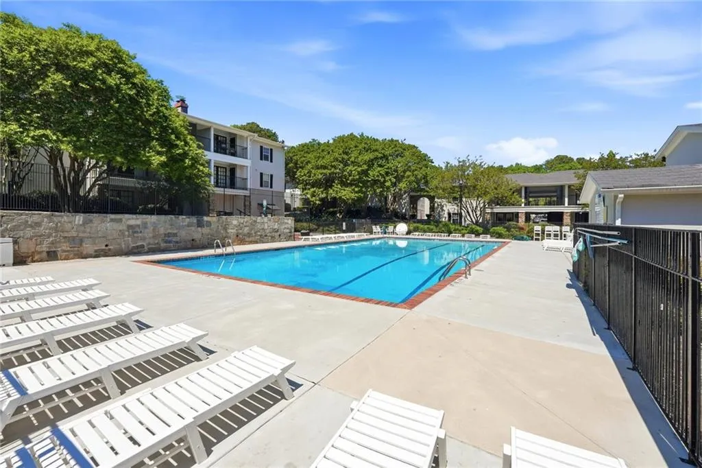 Community pool featuring a patio area