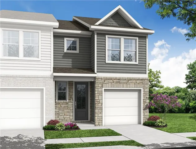 View of front of house featuring stone siding, driveway, an attached garage, and a front lawn