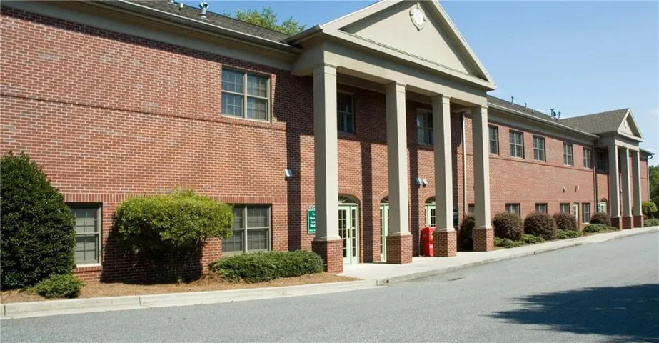 Brick facade construction with multiple windows