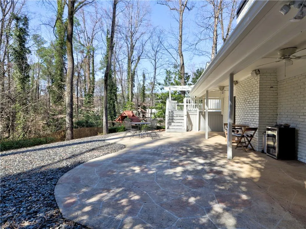 View of patio with ceiling fan