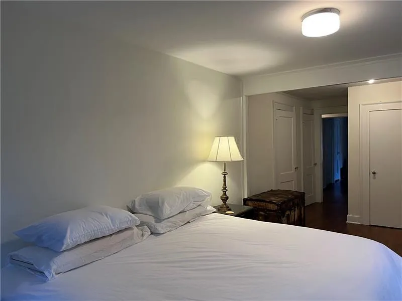 Bedroom featuring dark wood finished floors