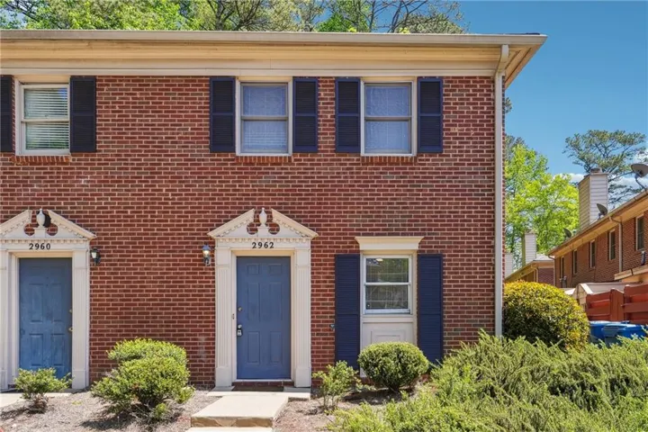 View of front facade featuring brick siding