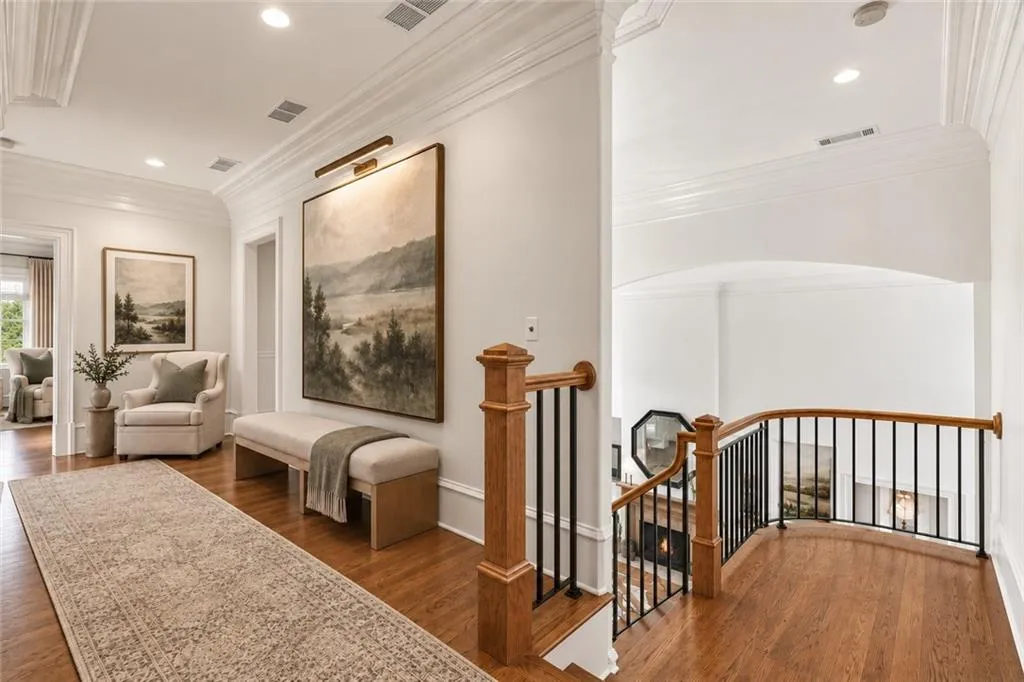 Virtually staged and removed only scroll parts of iron railing-- Furnishings and decor are digitally rendered