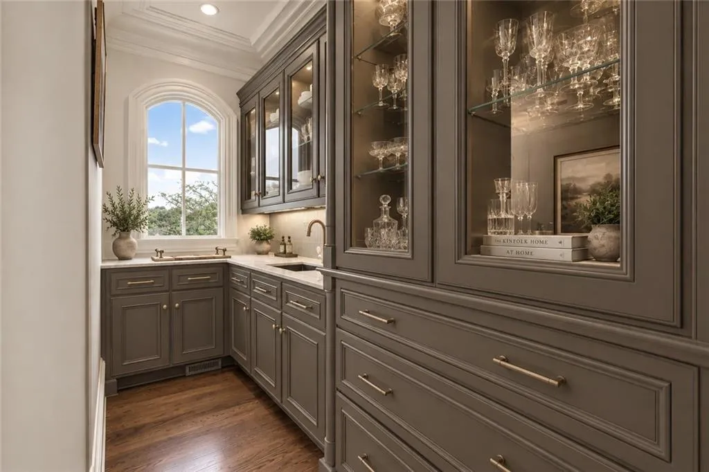Virtually staged -- PAINTED CABINETS< CHNAGE HARDWARE AND COUNTERS - Lighting, Furnishings and decor are digitally rendered