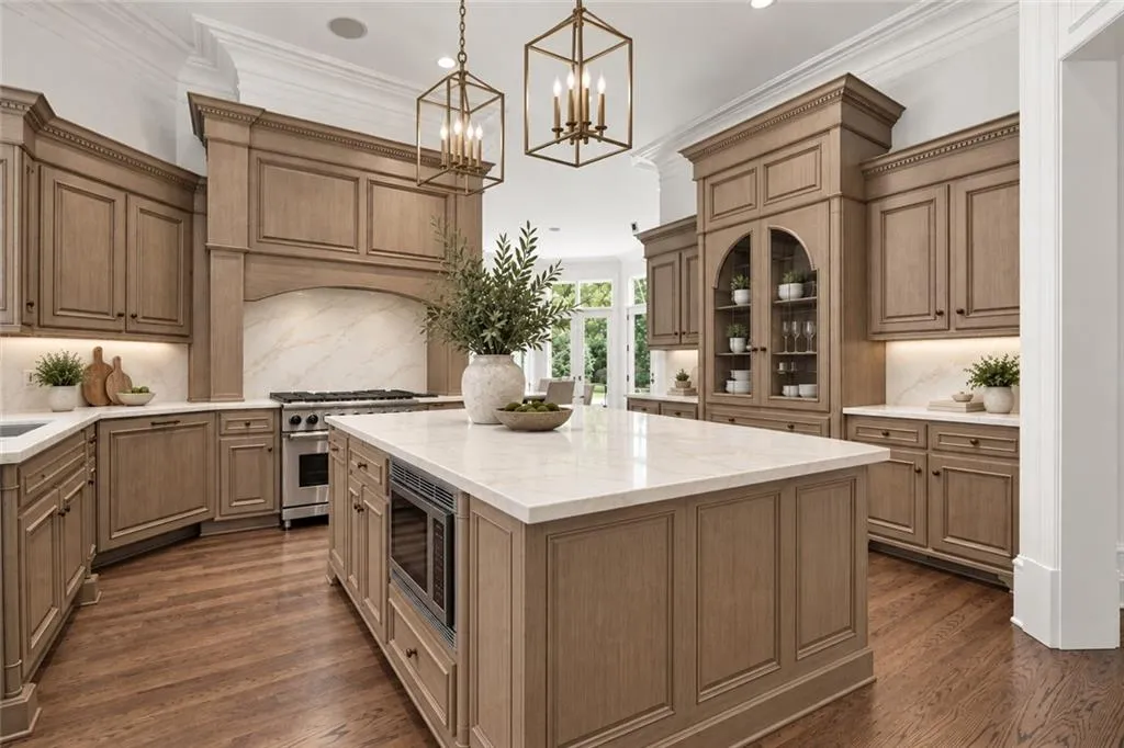 Virtually staged --EASY UPDATE WITH REFINISHED CABINETS AND NEW COUNTERS - Lighting, Furnishings and decor are digitally rendered