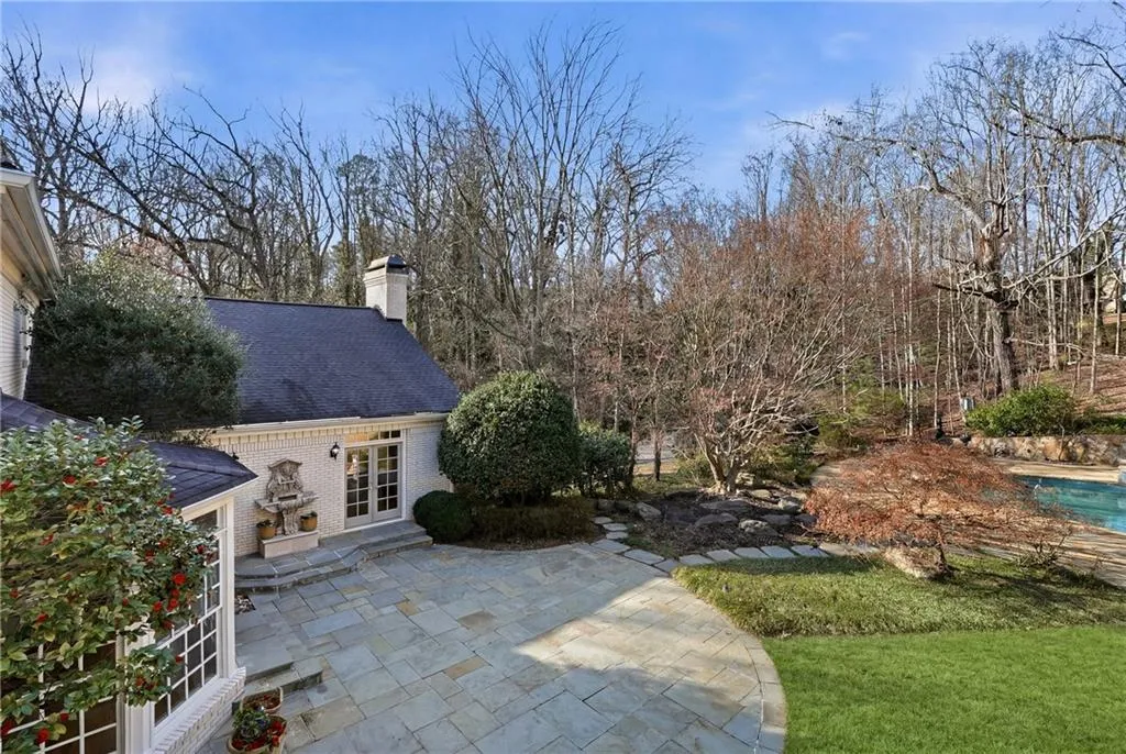 View of patio / terrace featuring french doors and an outdoor pool