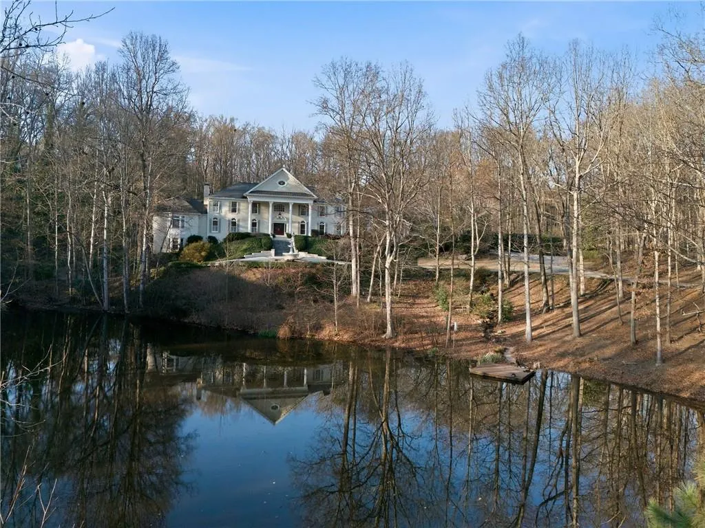 Water view featuring a tree filled landscape