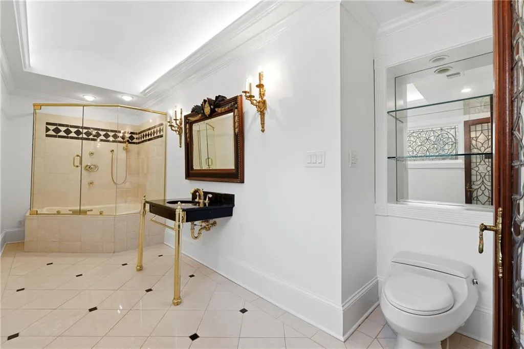 Full bathroom featuring ornamental molding, light tile patterned floors, recessed lighting, and tiled shower / bath