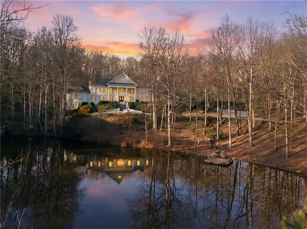 Water view with a tree filled landscape