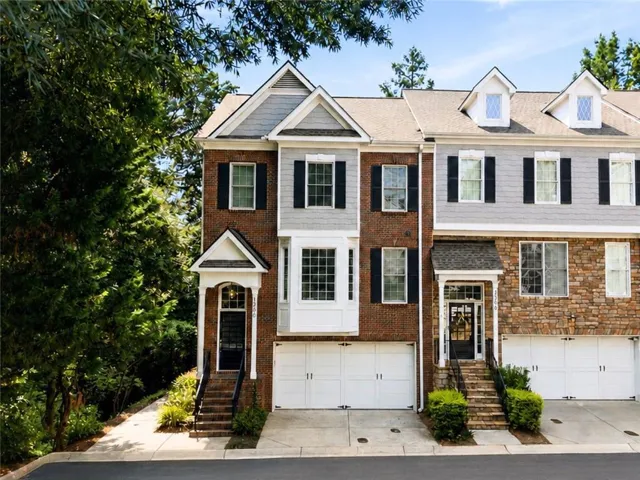 Brick and siding exterior with dormer windows