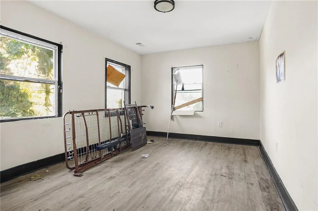 Unfurnished room with light wood-style floors