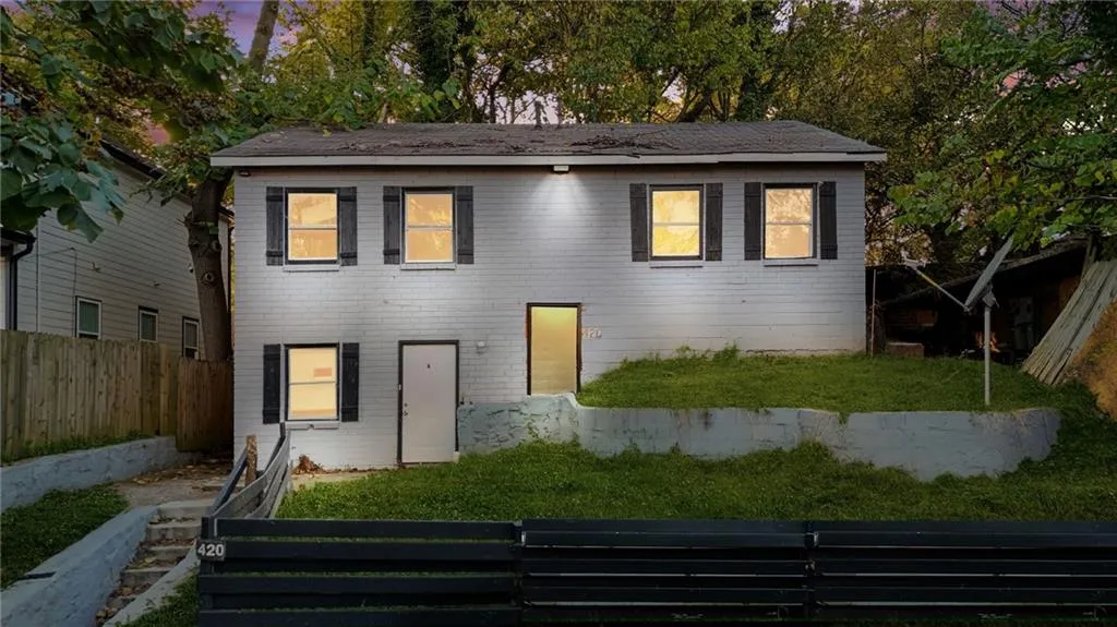 View of front of home with brick siding