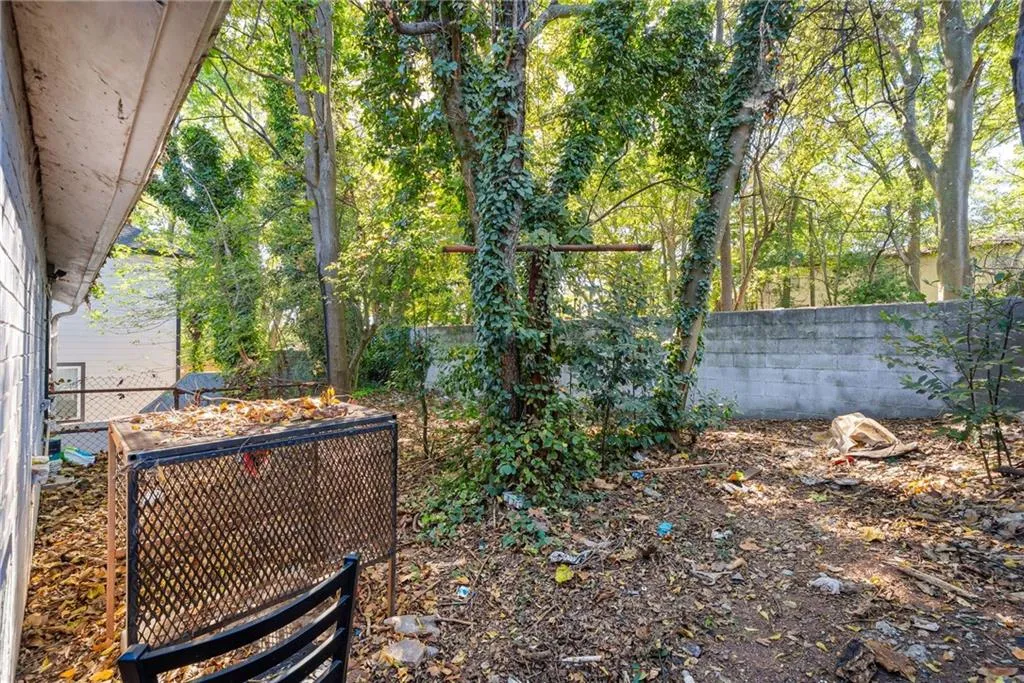 View of fenced backyard