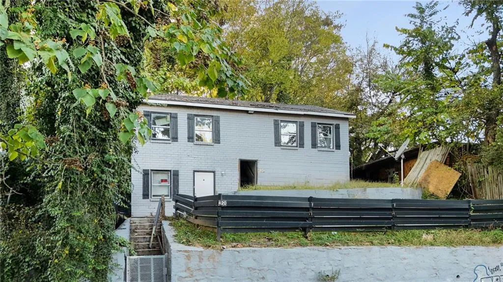 View of front of home with brick siding