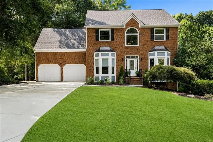 elevation, flat entry garage with new driveway