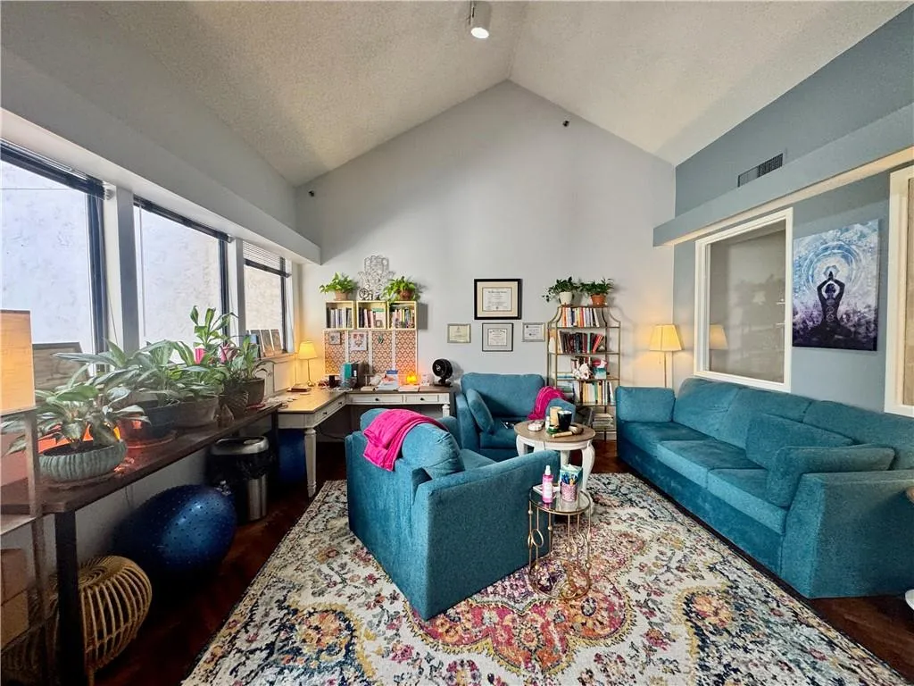 Upstairs Huge office/conference room, with hardwood floors, storage closet, and a gorgeous view of the water