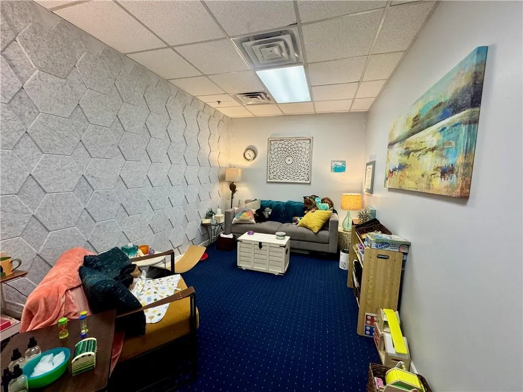 Featuring high ceilings, a window, and soundproofing