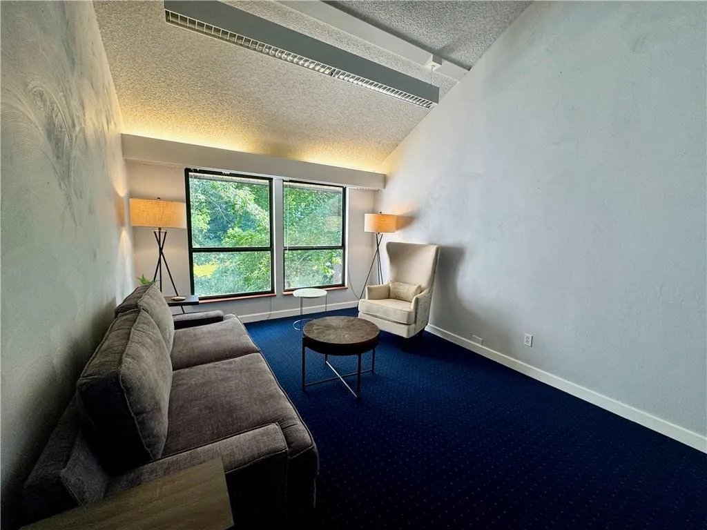 Upstairs office with vaulted ceiling and a gorgeous water view