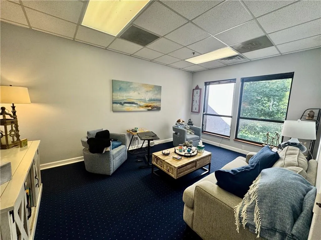Bright and light filled, with a gorgeous water view of the pond