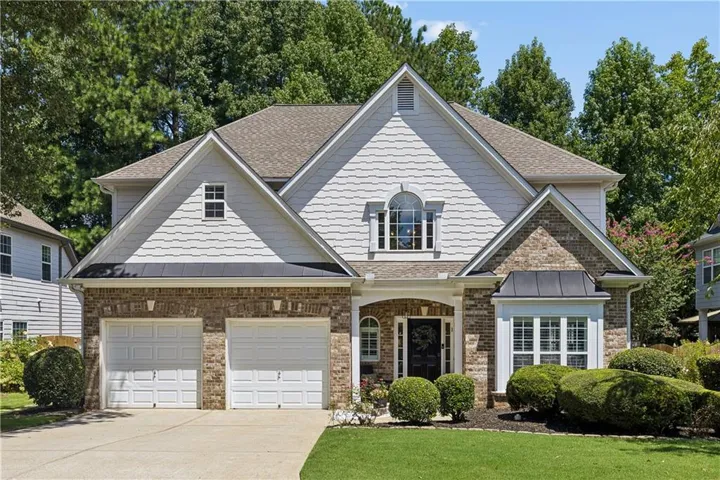 Brick and siding exterior with gabled roof lines