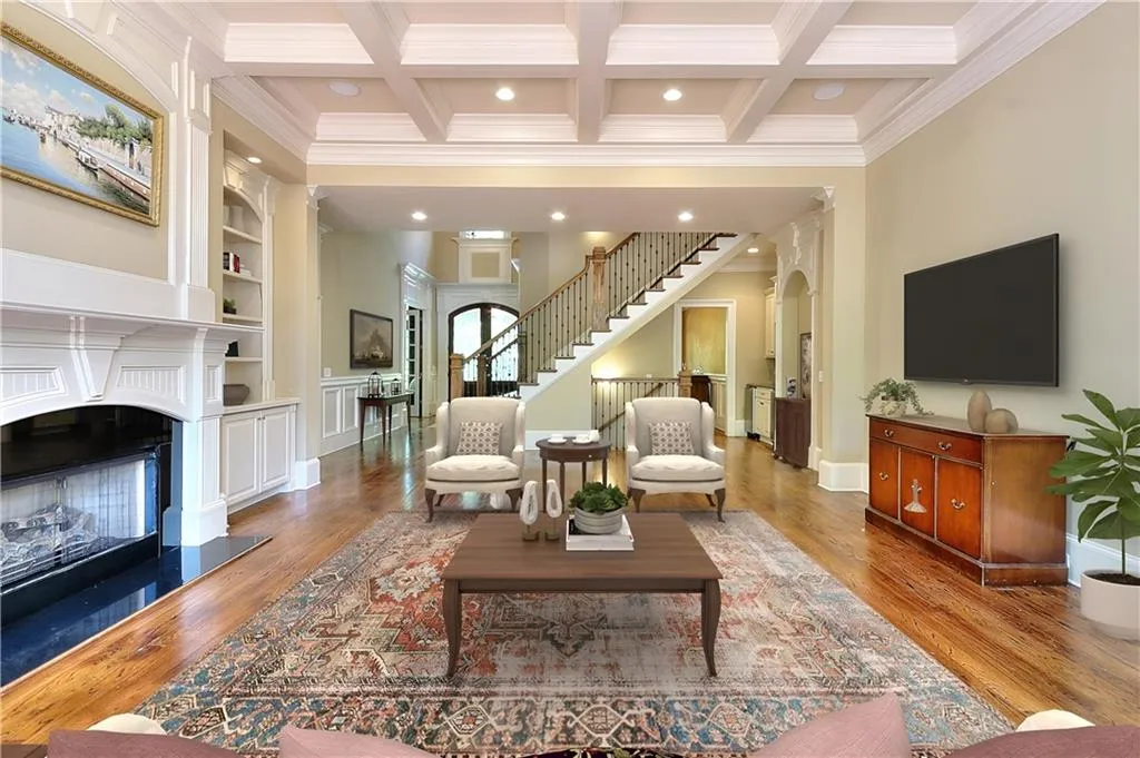 Digitally Staged-Living room with dark wood-type flooring, coffered ceiling, and beamed ceiling