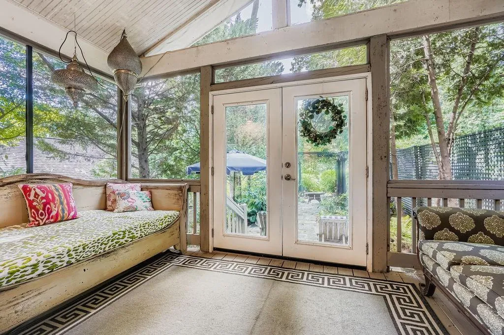 Sunroom with french doors and lofted ceiling
