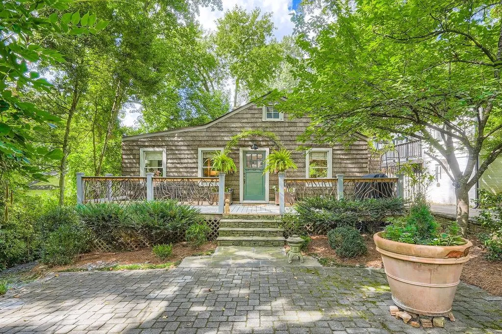 View of front of house with a deck