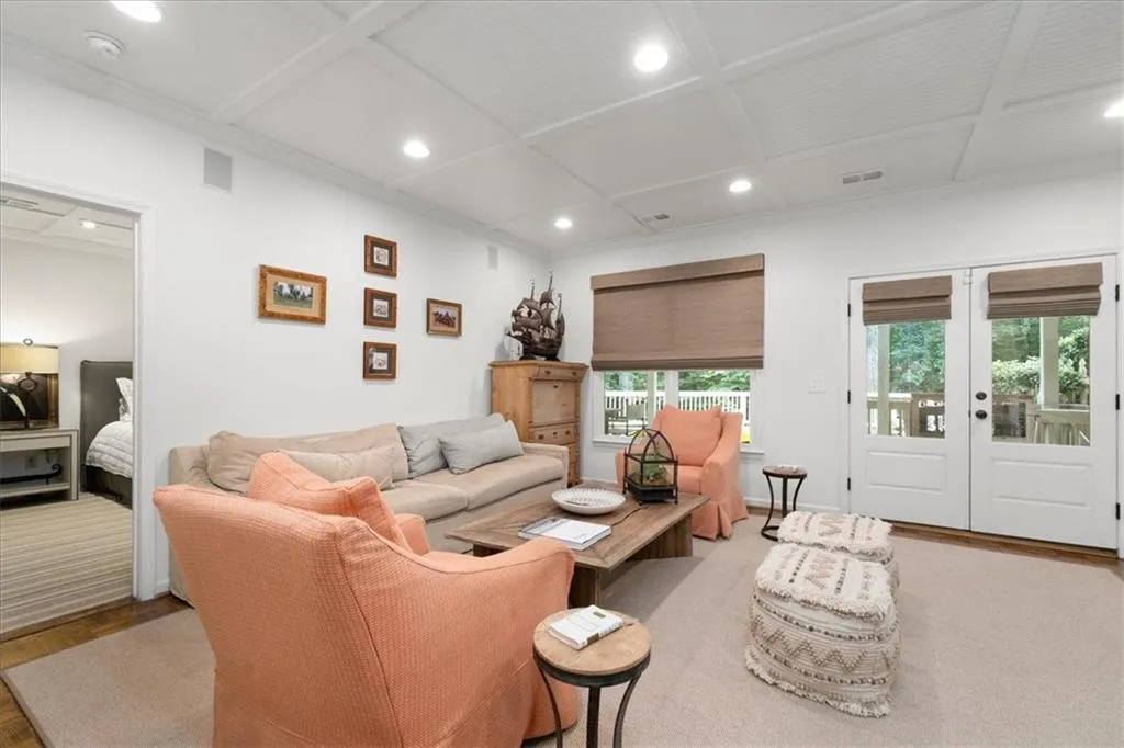 Terrace level opens to covered deck.