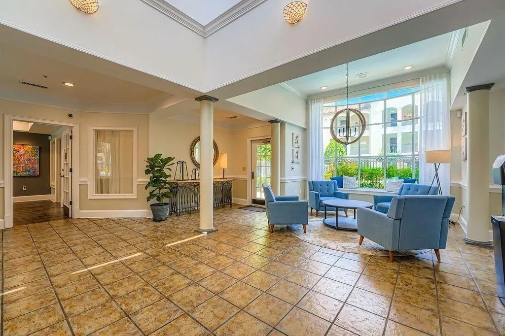 Common area featuring ornamental molding and recessed lighting