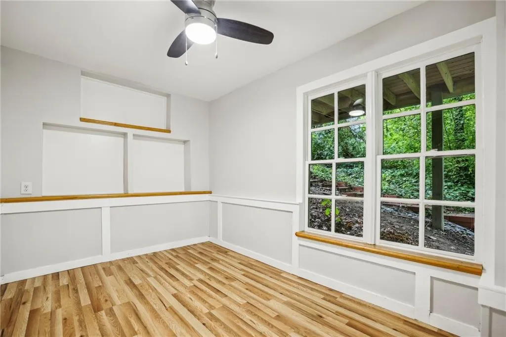 Office, yoga room or art studio on the back of the home has a separate entrance and faces the woods for a serene place to escape!