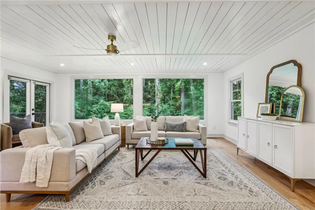 Custom picture windows showcase the amazing view from the primary living area