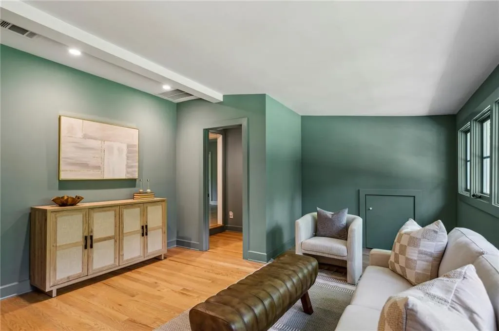 Upstairs bonus room or 5th bedroom with gorgeous windows and green view all around!