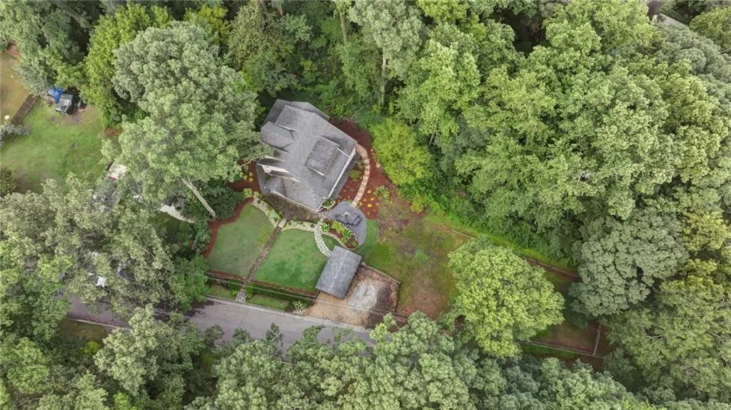 2 acres of protected wildlife habitat sits behind the home