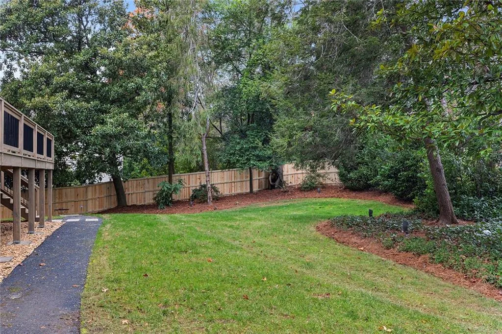 View of fenced backyard