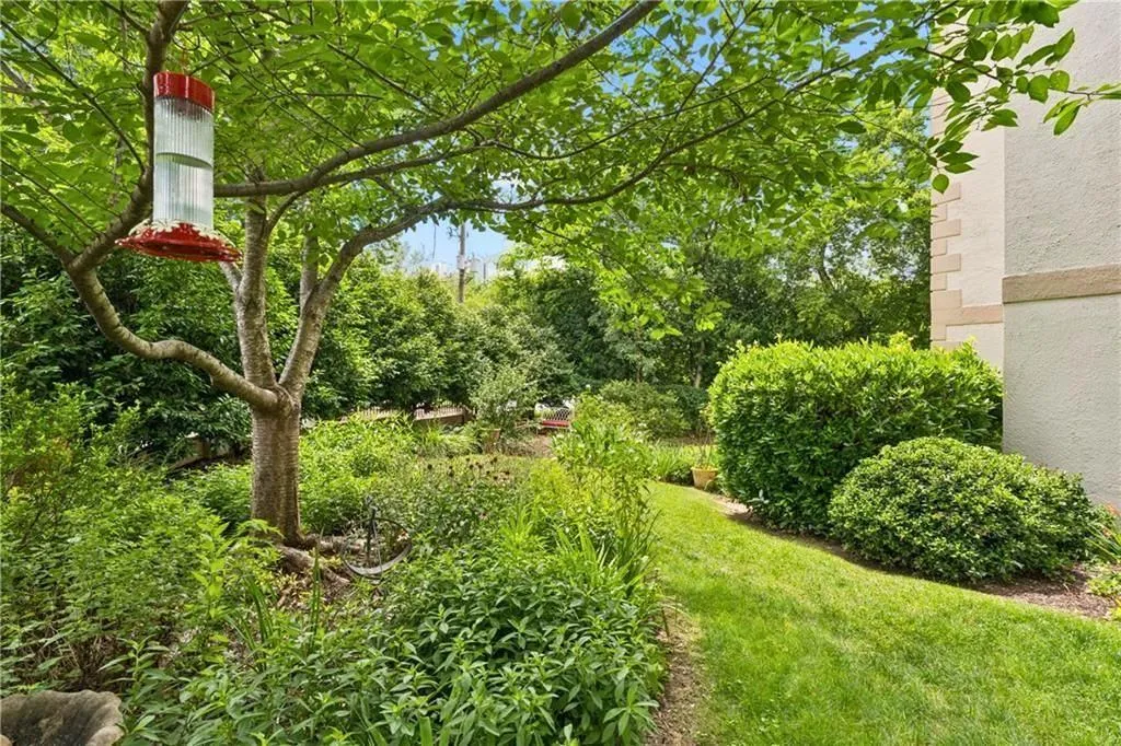 Mature and manicured landscaping.