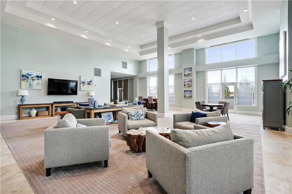 Lobby with a high ceiling and recessed lighting